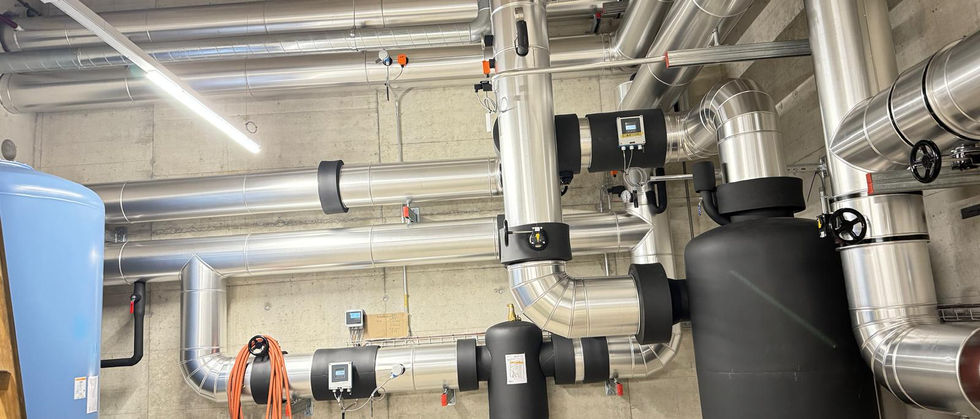 Plant room with insulated ventilation ducts and pipework